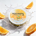 Kryze Citrus Mint caffeine pouch can with orange slices and water splash